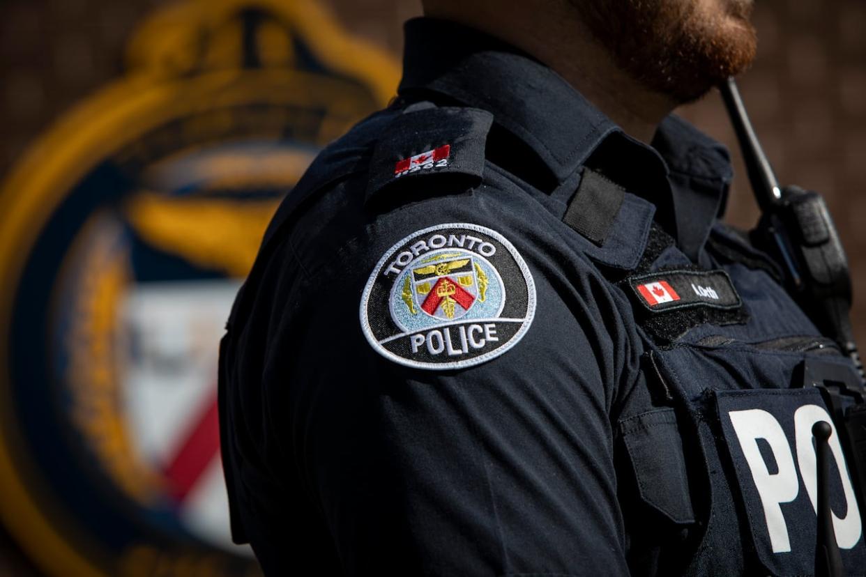 Toronto Police Const. James Bragg appeared before the tribunal Tuesday after he was charged with four counts of discreditable conduct and one count of insubordination.  (Evan Mitsui/CBC - image credit)