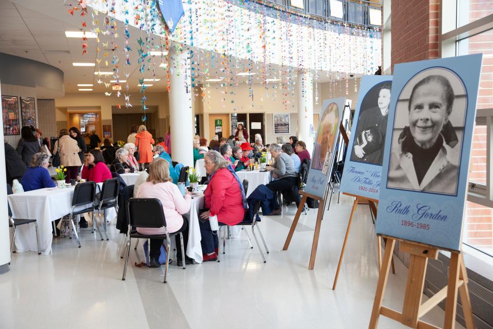 Participants enjoy tea and snacks during "Remember the Ladies" at Quincy High School on Saturday, March 5, 2022.