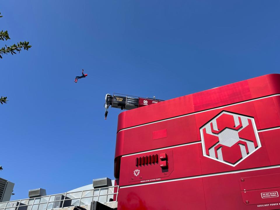 spider man doing a stunt at disneyland avengers campus