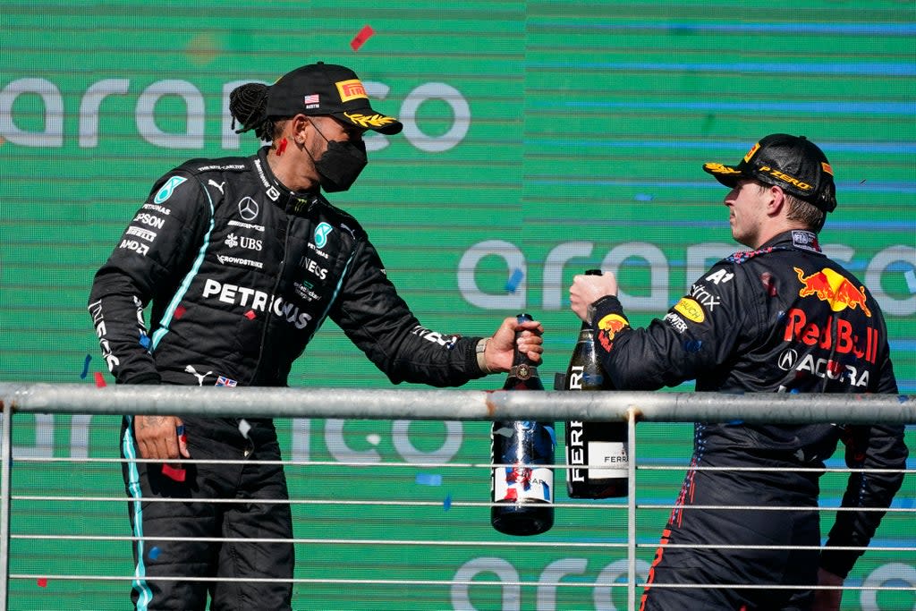 Red Bull driver Max Verstappen, right, boasts a 12 point lead over and Mercedes driver Lewis Hamilton (AP)