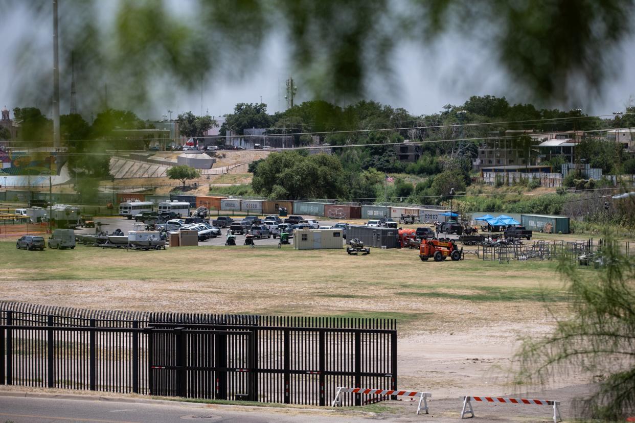 Department of Public Safety troopers and National Guard soldiers keep watch for migrants crossing the border illegally in Shelby Park.