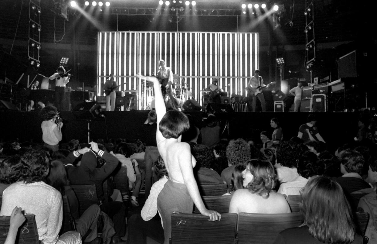 David Bowie, powered by Alomar and the D.A.M. Trio, performing at the Boston Garden, 1978. (Credit: Ron Pownall/Corbis via Getty Images)