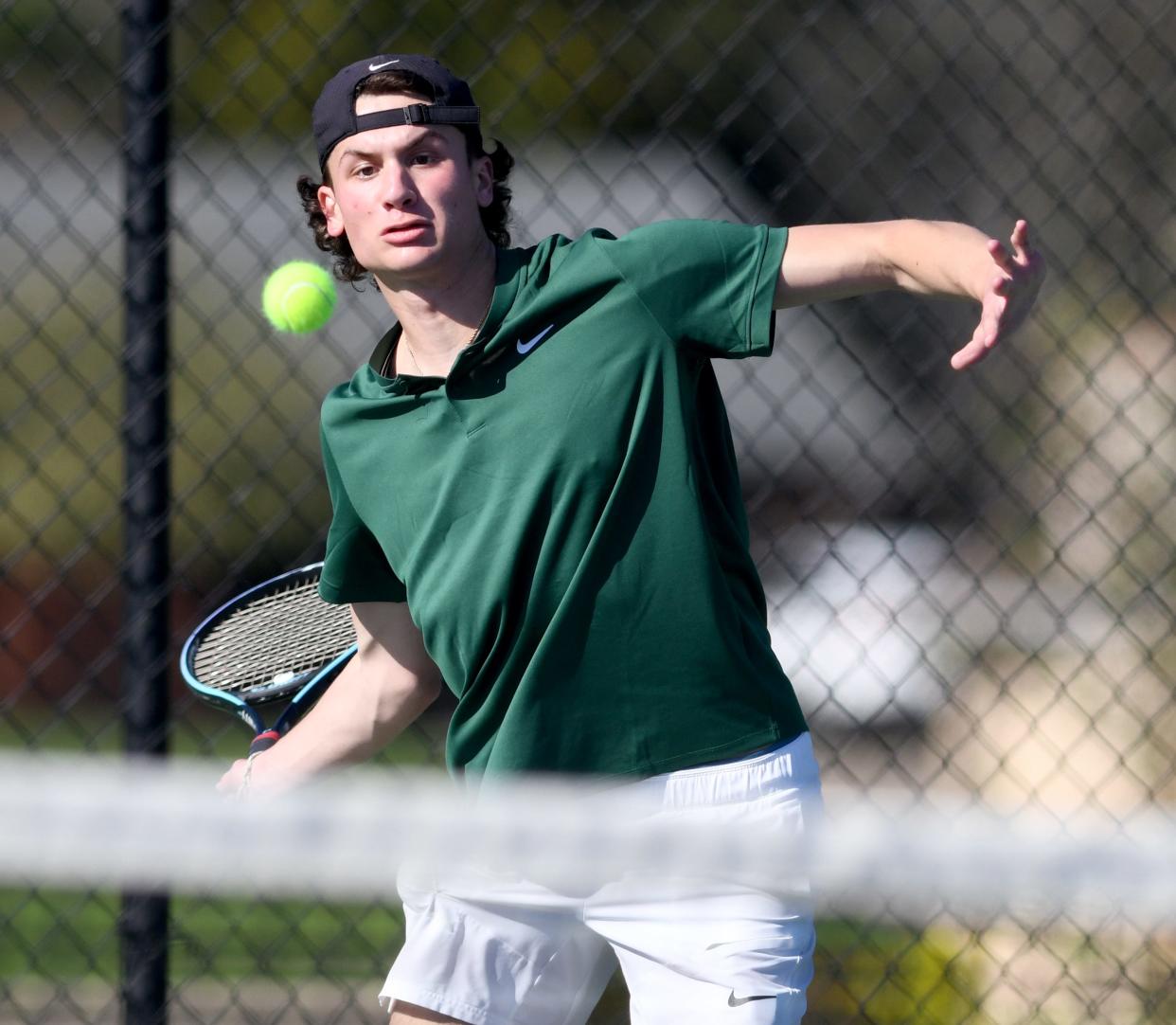 GlenOak's Jake Charles plays No. 2 singles against Hoover's Jackson Vance on Monday.