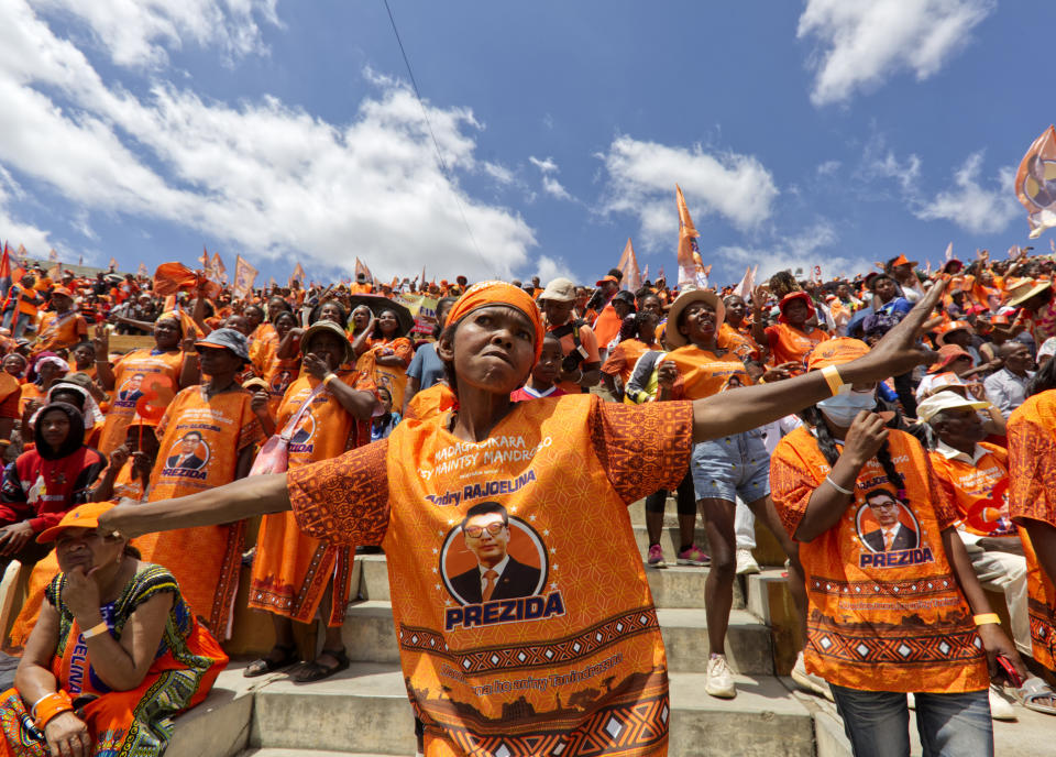 Ruling party supporters of President, Andry Rajoelina, attend an election rally in Antananarivo, Sunday Nov. 12, 2023. Madagascar's Andry Rajoelina is pushing ahead with a presidential election, Thursday, Nov. 16, that could give him a third term, even as opposition protests roil the country and the majority of candidates have announced a boycott. (AP Photo/Alexander Joe)