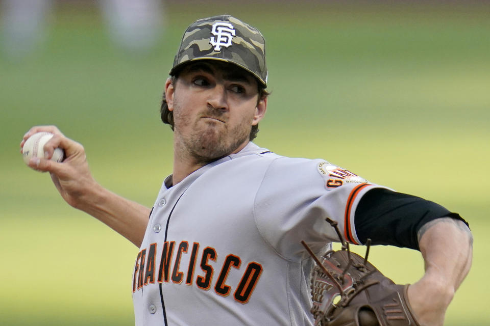 San Francisco Giants starting pitcher Kevin Gausman delivers during the first inning of a baseball game against the Pittsburgh Pirates in Pittsburgh, Friday, May 14, 2021. (AP Photo/Gene J. Puskar)