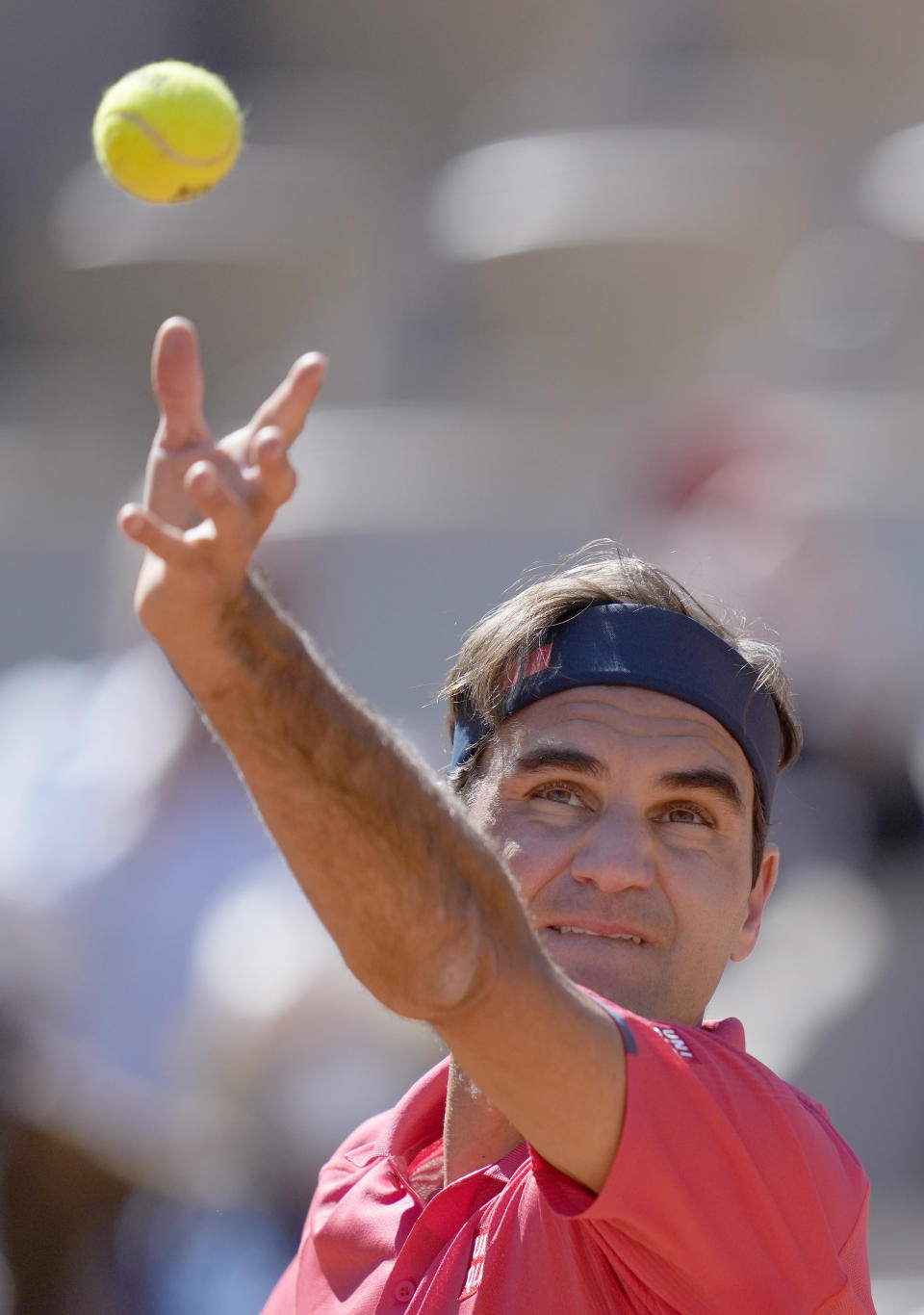 Switzerland's Roger Federer serves to Uzbekistan's Denis Istomin during their first round match on day two of the French Open tennis tournament at Roland Garros in Paris, France, Monday, May 31, 2021. (AP Photo/Thibault Camus)