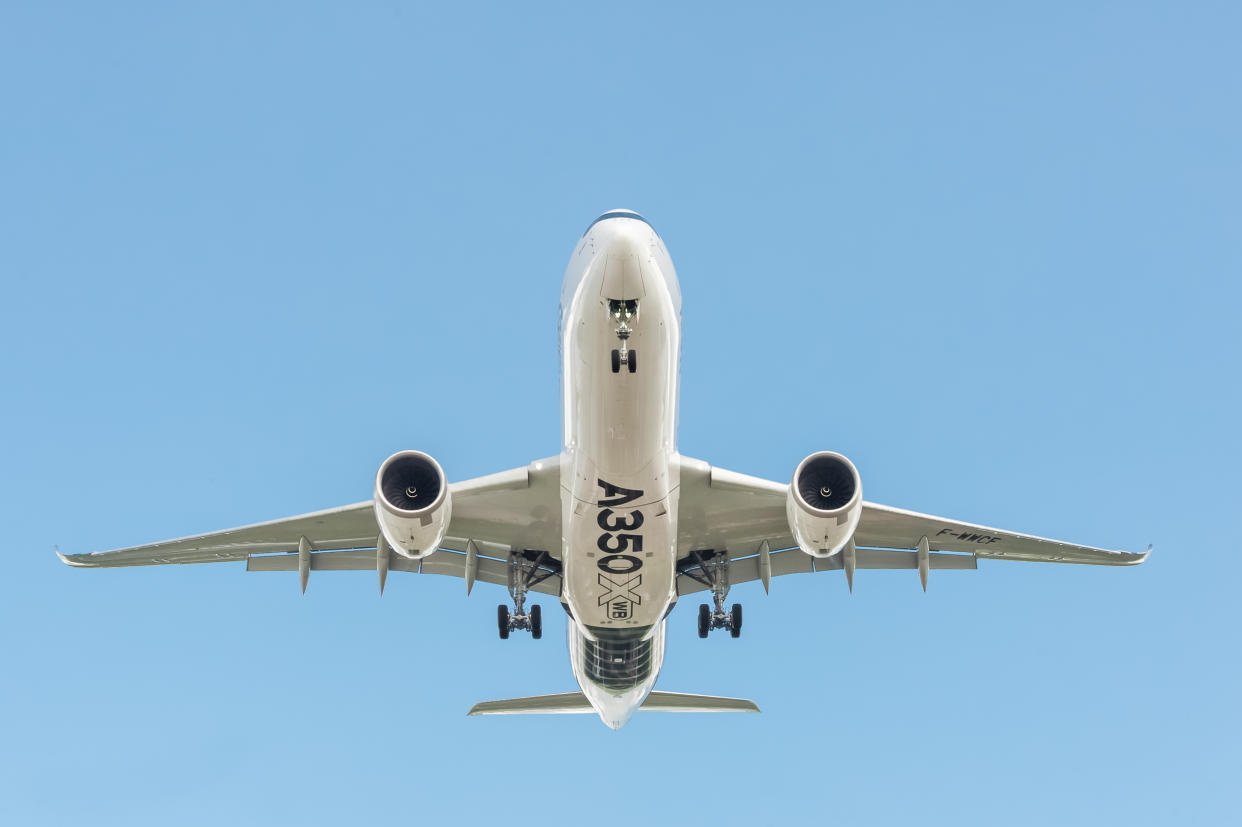 Farnborough, UK - July 14, 2016: Airbus A350 XWB landing at Farnborough as part of a display of aircraft for an international aviation trade event. The XWB initials denote the aircrafts Xtra Wide Body design.