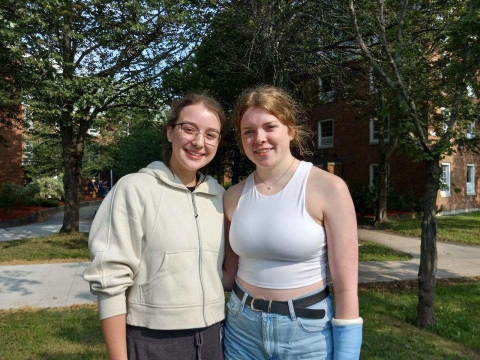 Bridgit Tooker and Holly Morgan are both second year students moving back into residence.