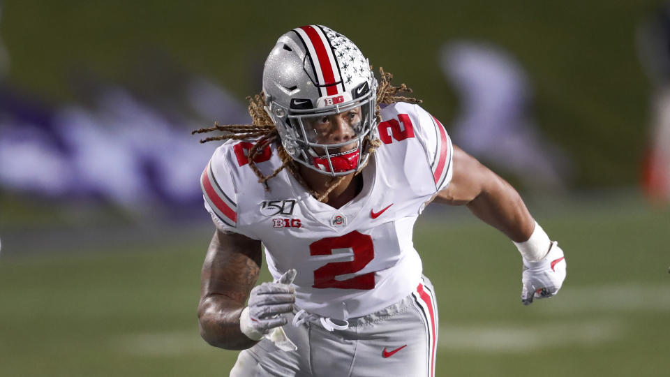 Ohio State defensive end Chase Young rushes the Northwestern quarterback during the second half of an NCAA college football game Friday, Oct. 18, 2019, in Evanston, Ill. (AP Photo/Charles Rex Arbogast)