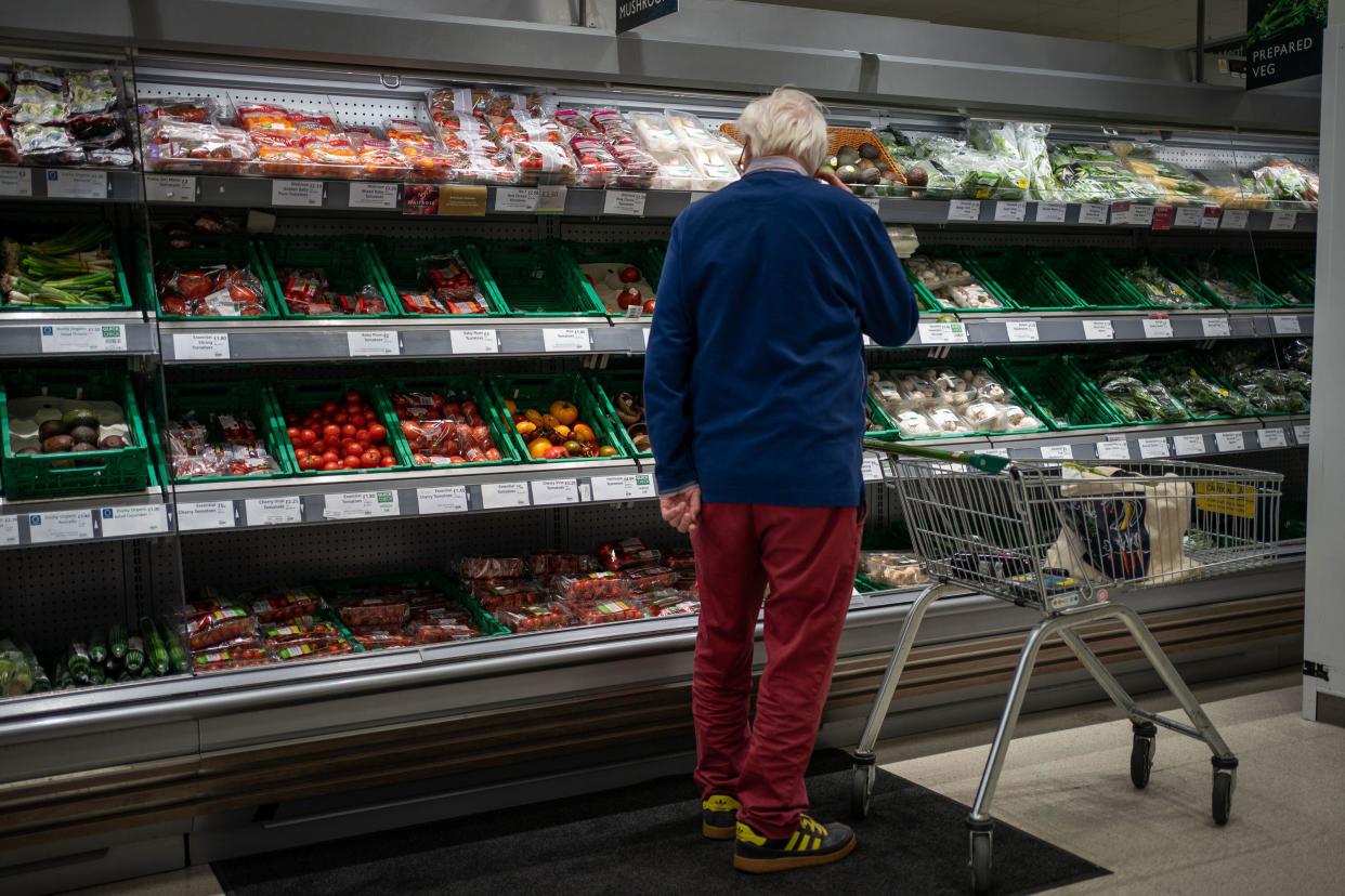 Inflation File photo dated 15/10/21 of a shopper looking at salad vegetables in a branch of Waitrose, as UK inflation shot up unexpectedly last month as vegetable shortages pushed food prices to their highest rate in more than 45 years, according to official figures.