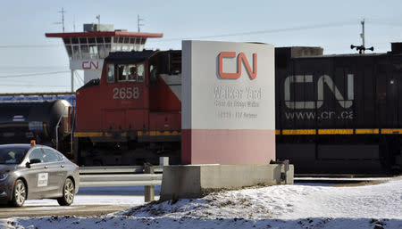 A locomotive moves through the Canadian National (CN) railyards in Edmonton February 22, 2015. REUTERS/Dan Riedlhuber