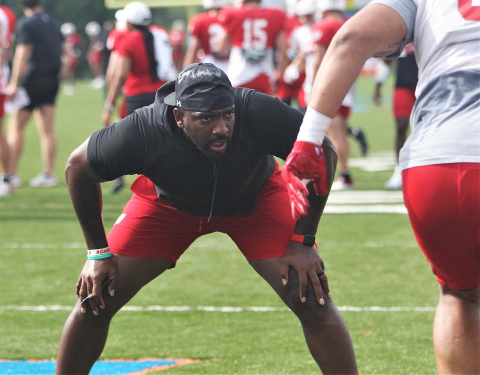 Wisconsin defensive line coach Greg Scruggs watches his players go through drills during practice Aug. 6, 2023 at Pioneer Stadium in Platteville, Wis.