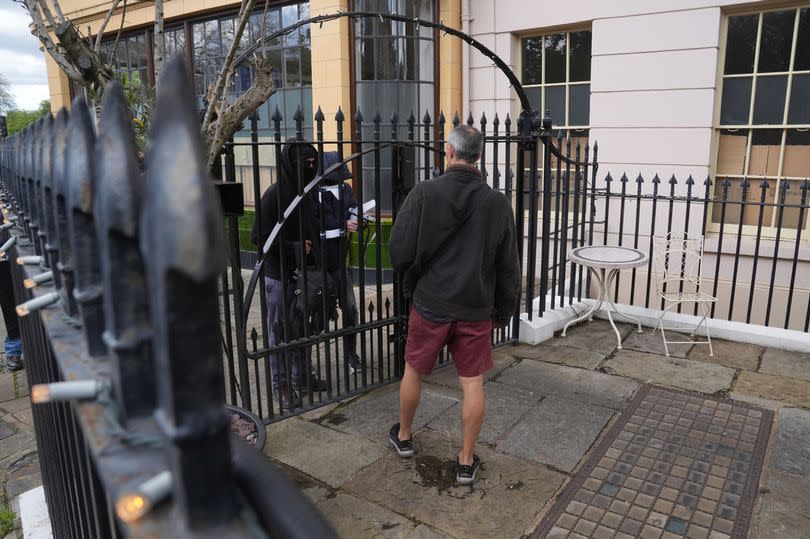 Squatters returning to the York & Albany pub near Regent's Park, London