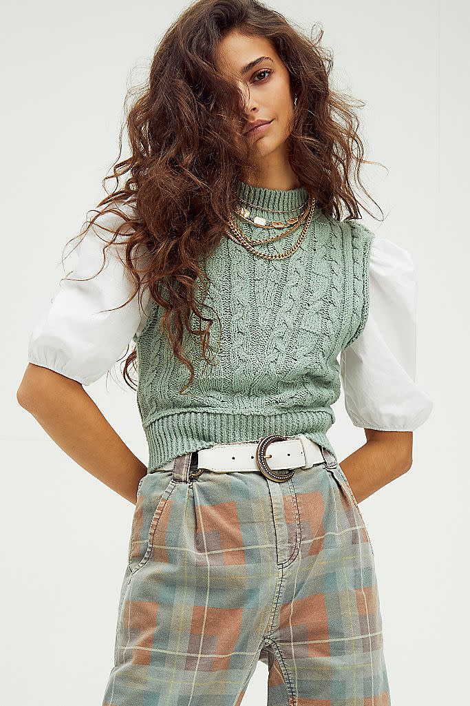 <p>This sweater vest from Free People looks like it was plucked from a grandfather’s wardrobe. The cable-knit design is often layered over simple tees and button-downs, to spice up an outfit. However, a true fashionista will get year-round use out of this staple and dare to wear it as a shirt, too.</p>