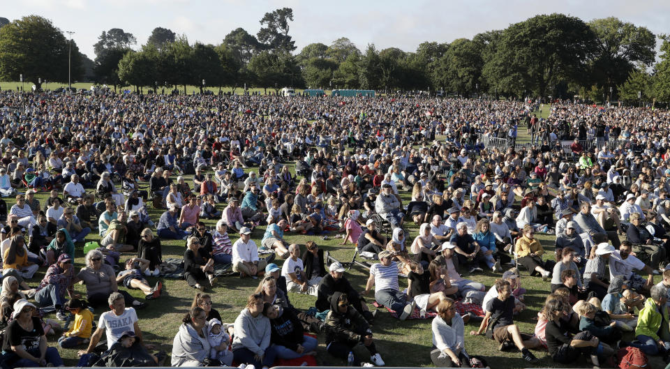 A huge crowd gathers for a vigil in Hagley Park following mass shooting in Christchurch. Source: AP Photo/Mark Baker