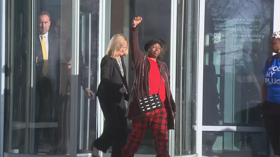 Sheneen McClain walked out of the Adams County Courthouse with her fist after the not guilty verdict was read for Aurora Police Officer Nathan Woodyard.  / Credit: CBS