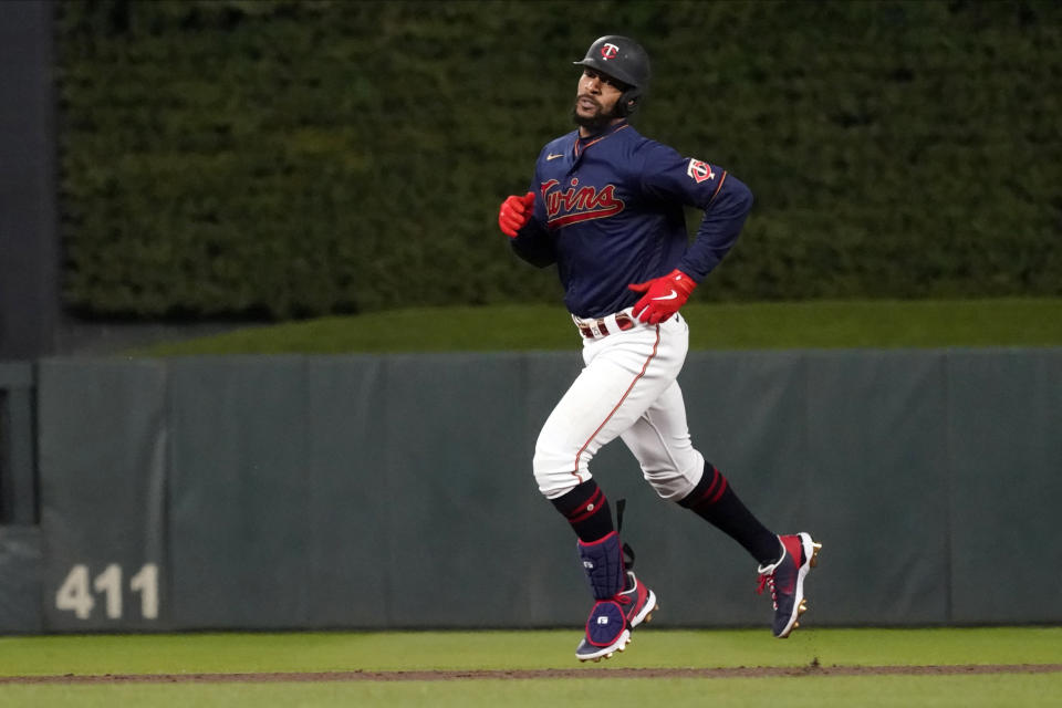 Minnesota Twins' Byron Buxton rounds the bases on a three-run home run off Toronto Blue Jays pitcher Jose Berrios in the third inning of a baseball game, Friday, Sept. 24, 2021, in Minneapolis. (AP Photo/Jim Mone)