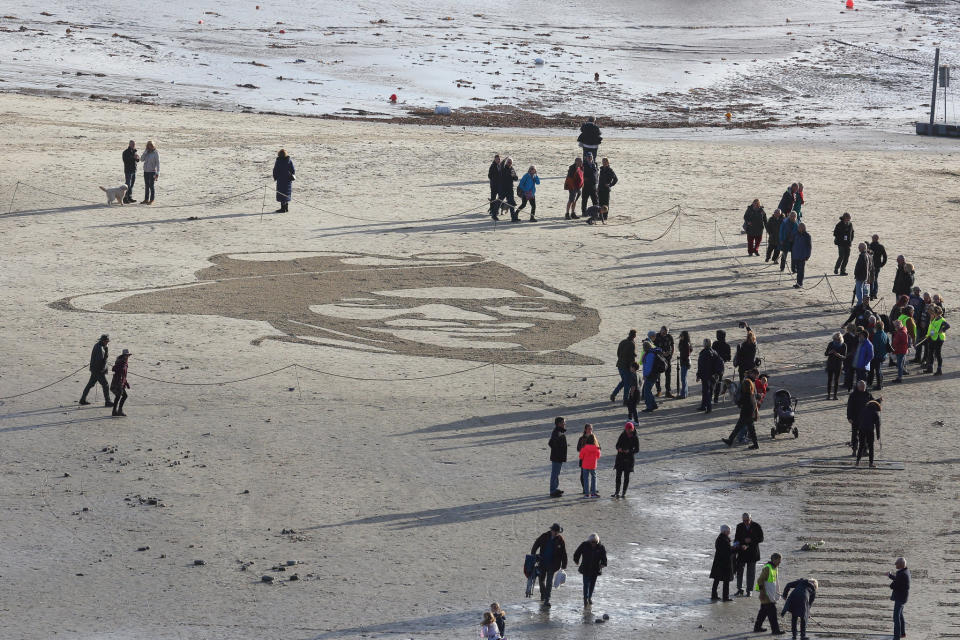 <p>Pages of the Sea: WW1 sand portrait tributes around UK </p>