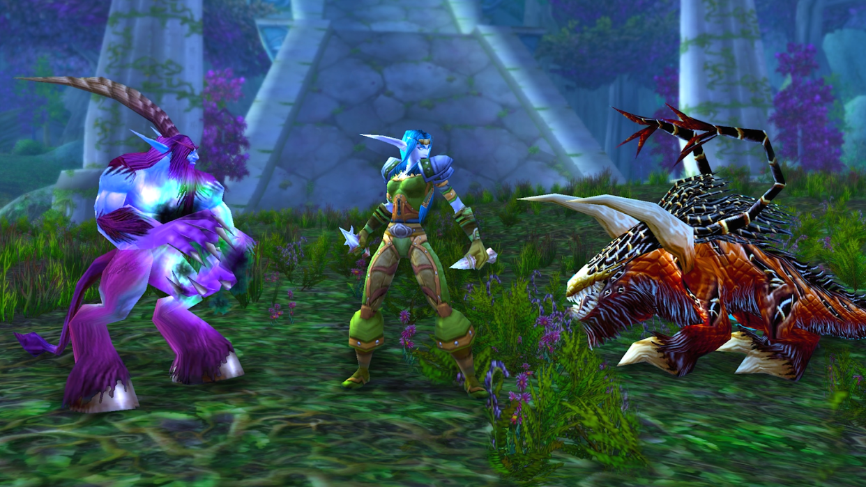  A night elf faces off against a satyr and a felhunter in World of Warcraft Season of Discovery Phase 3. . 