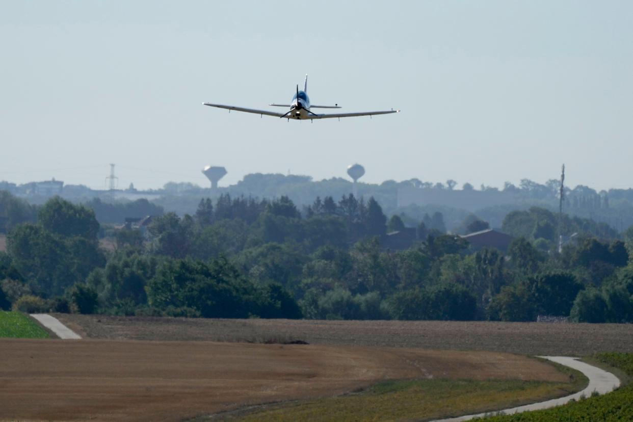 Mack Rutherford brings his plane in for a landing in Belgium on Tuesday, one stop short of completing his journey.