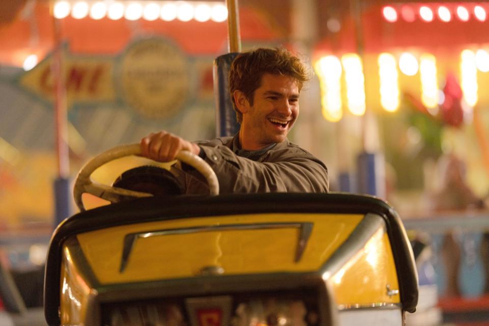 Garfield, in We Live in Time, on an amusement park ride.