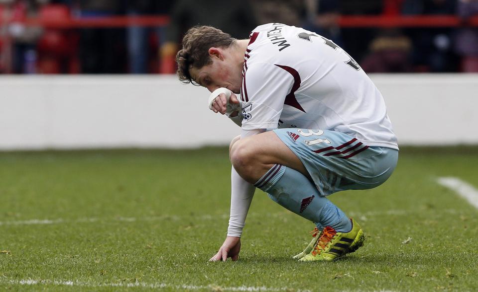 West Ham United's Danny Whitehead reacts after losing their FA Cup third round soccer match against Nottingham Forest at City Ground in Nottingham January 5, 2014. REUTERS/Stefan Wermuth (BRITAIN - Tags: SPORT SOCCER)