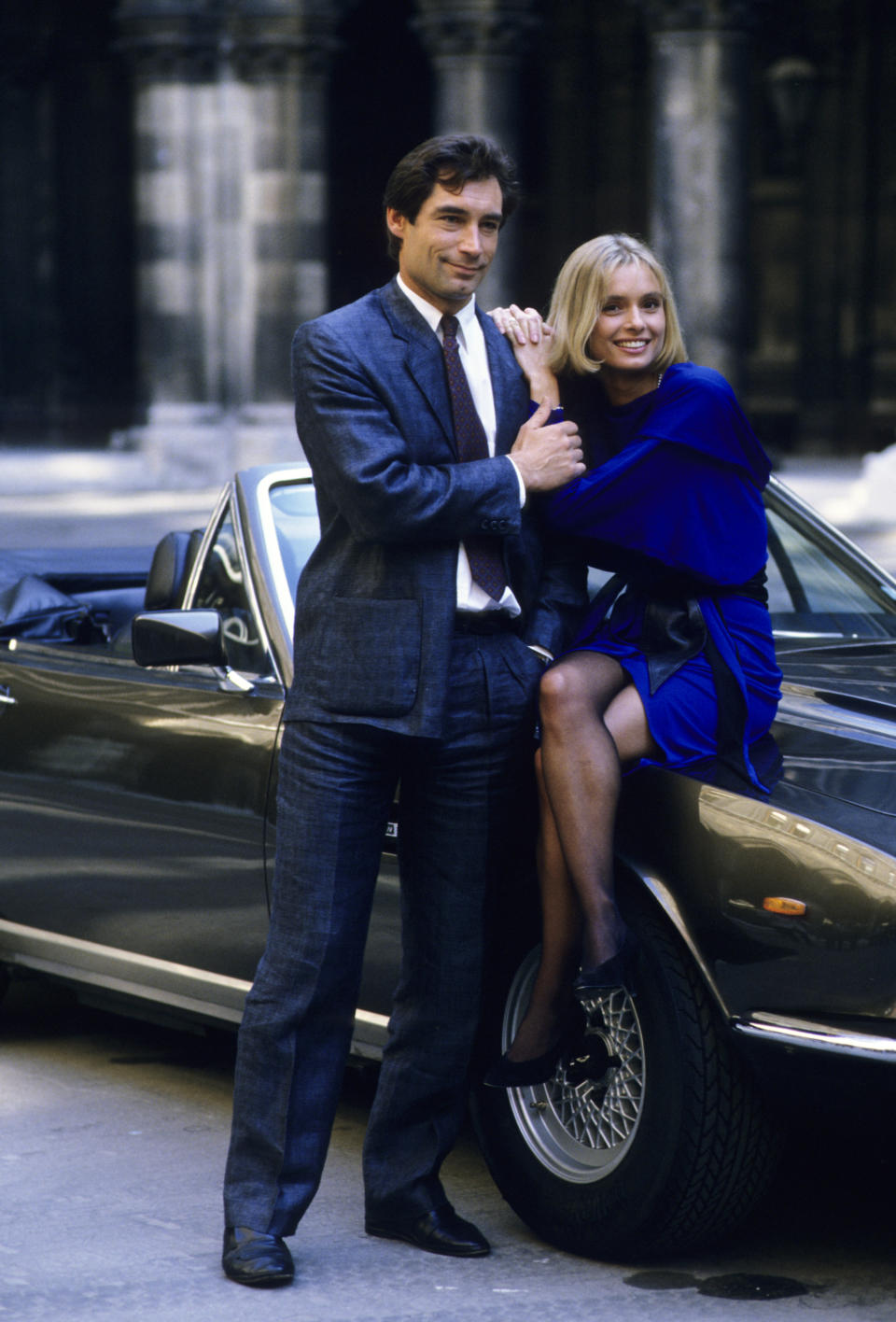 Welsh actor Timothy Dalton with his co-star Maryam D'Abo during production of the James Bond film 'The Living Daylights' on location in Austria on October 5, 1986.  (Photo by Georges De Keerle/Getty Images)