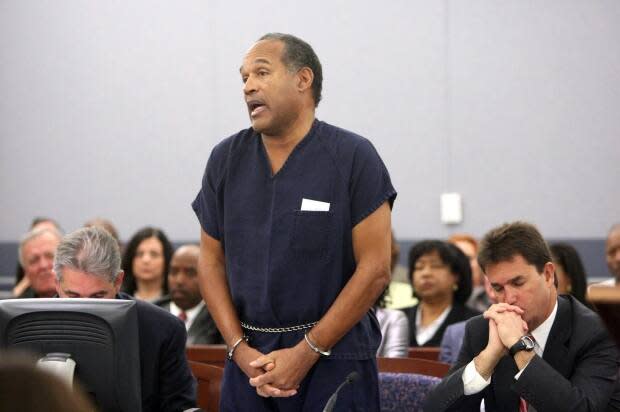 In this Dec. 5, 2008, file photo, O.J. Simpson speaks during his sentencing hearing at the Clark County Regional Justice Center in Las Vegas, in connection with hotel armed robbery.