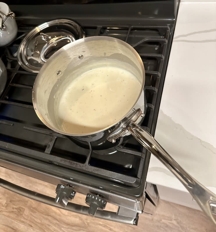 Making Ina's béchamel sauce<p>Kelli Acciardo</p>