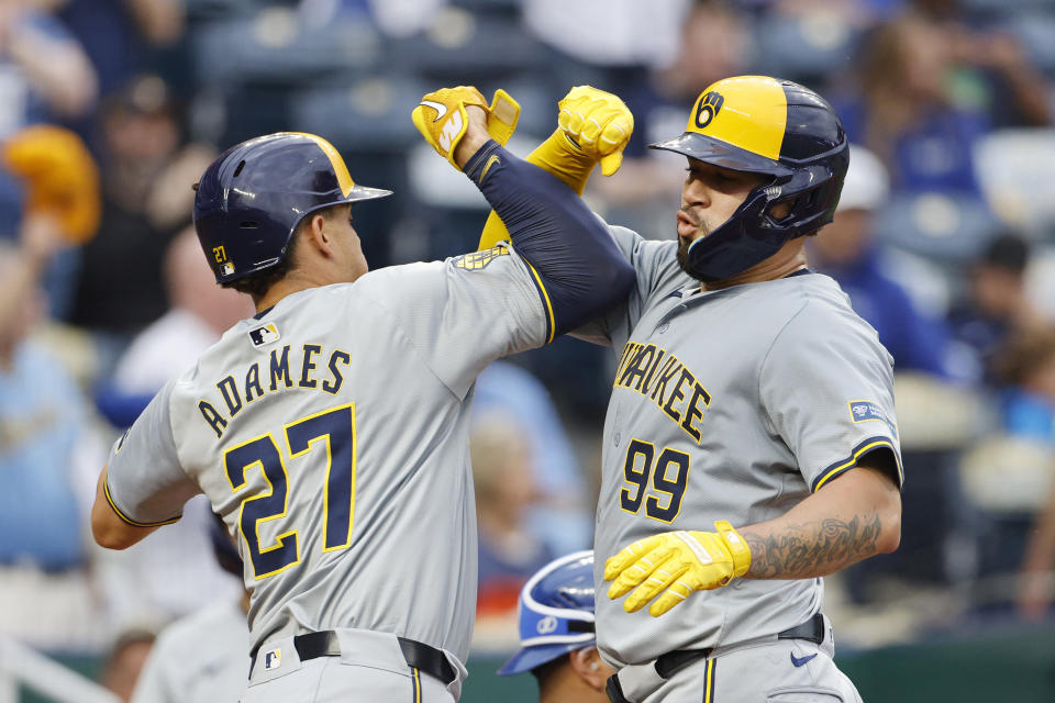 Milwaukee Brewers' Gary Sánchez (99) celebrates with Willy Adames (27) after hitting a two-run home run during the fourth inning of a baseball game against the Kansas City Royals in Kansas City, Mo., Monday, May 6, 2024. (AP Photo/Colin E. Braley)