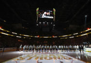 <p>Fans join in unison to sing a stirring rendition of the “Star-Spangled Banner.” (Bruce Bennett/Getty Images) </p>