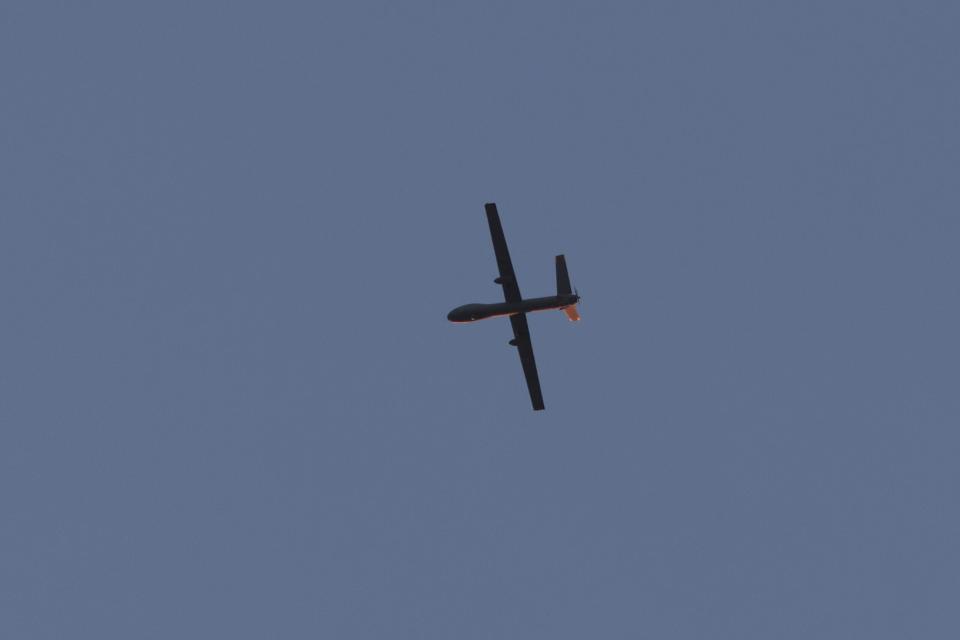 A picture taken from the southern Israeli city of Sderot shows an Israeli Air Force Hermes 950 drone over the northern Gaza Strip, on October 29, 2023. <em>Photo by JACK GUEZ/AFP via Getty Images</em>