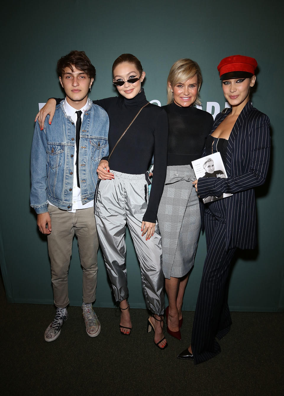 Hadid with her three children, models Anwar, Gigi, and Bella. (Photo: Getty)