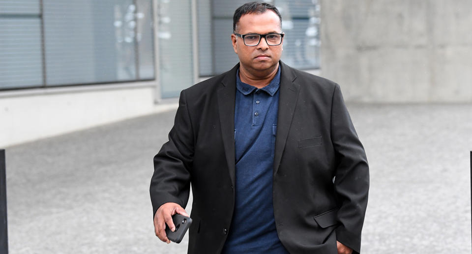 Sampath Samaranayake is seen leaving the Brisbane District Court in Brisbane,  Monday, March 8, 2021. Sampath Sandaruwan Samaranayake is on trial for allegedly pretending to be an Uber driver before allegedly sexually assaulting women. (AAP Image/Darren England) NO ARCHIVING