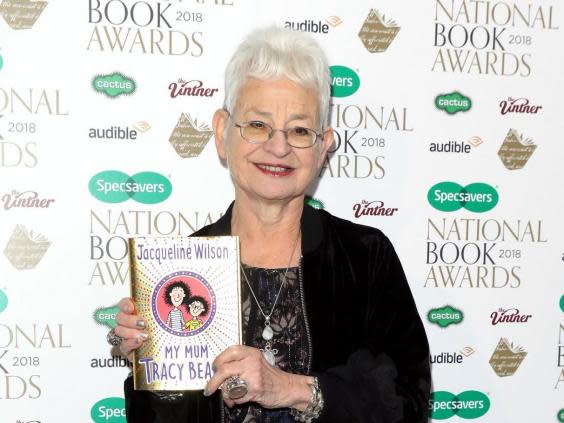 Jacqueline Wilson poses with a Tracy Beaker book (Getty)