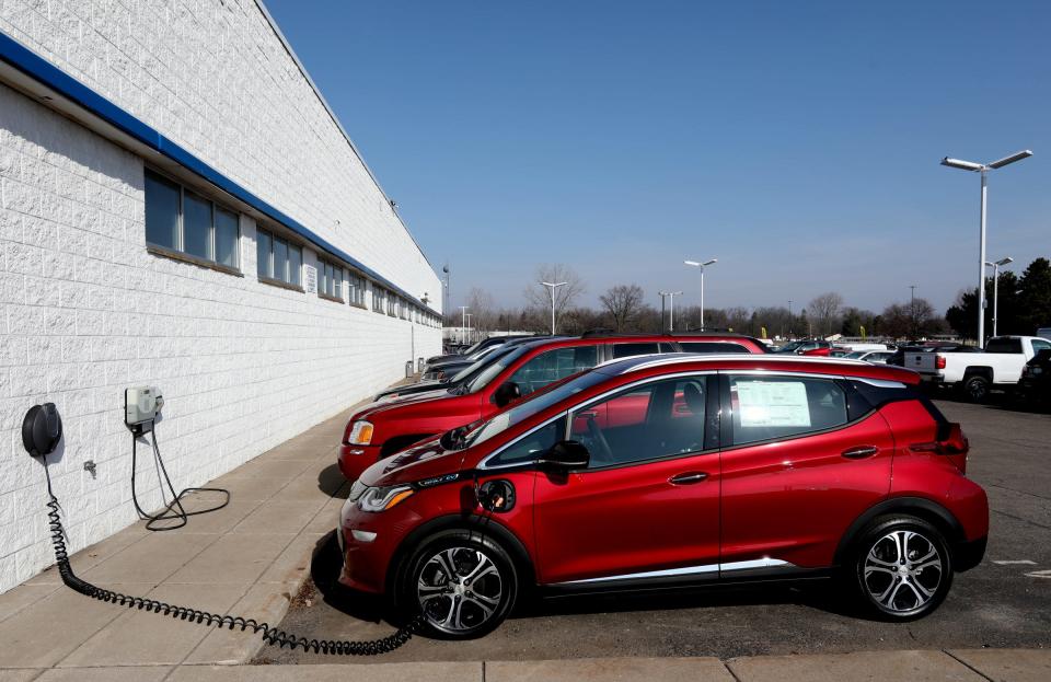 A Chevy Bolt EV getting a charge at Shaheen Chevrolet in Lansing on March 17, 2021.