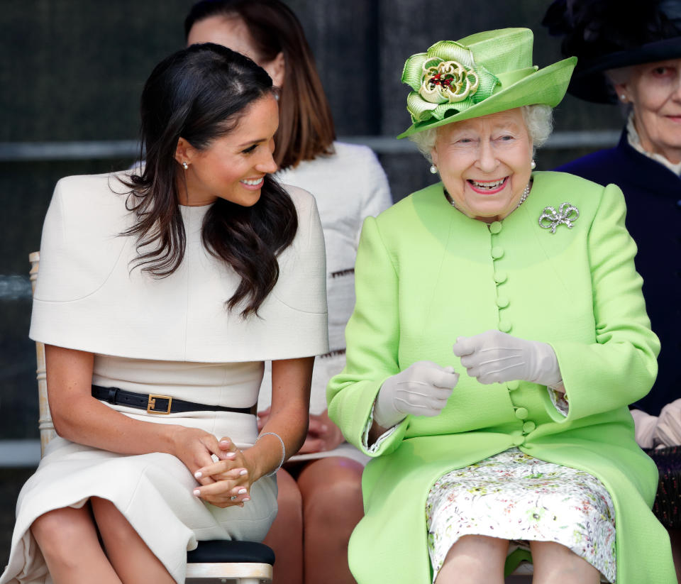 WIDNES, UNITED KINGDOM - JUNE 14: (EMBARGOED FOR PUBLICATION IN UK NEWSPAPERS UNTIL 24 HOURS AFTER CREATE DATE AND TIME) Meghan, Duchess of Sussex and Queen Elizabeth II attend a ceremony to open the new Mersey Gateway Bridge on June 14, 2018 in Widnes, England. Meghan Markle married Prince Harry last month to become The Duchess of Sussex and this is her first engagement with the Queen. During the visit the pair will open a road bridge in Widnes and visit The Storyhouse and Town Hall in Chester. (Photo by Max Mumby/Indigo/Getty Images)