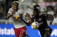 New York Red Bulls forward Fabio Gomez, left, vies with Inter Miami midfielder Blaise Matuidi during the first half of an MLS soccer match, Friday, Sept. 17, 2021, in Fort Lauderdale, Fla. (AP Photo/Rebecca Blackwell)