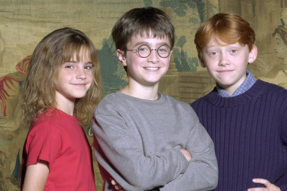 Harry Potter stars (L-R) Emma Watson, Daniel Radcliffe, and Rupert Grint in 2000, will be a tough act to follow for the new crop of actors replacing them in the new series (Getty Images)