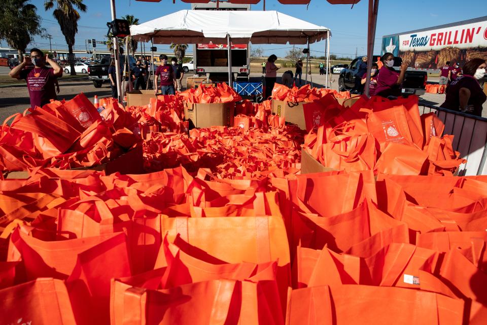 More than 3,000 turkeys waited for distribution during the Thomas J. Henry annual Turkey Giveaway at the Fairgrounds Field Stadium in Robstown, Texas on Saturday, Nov. 21, 2020.