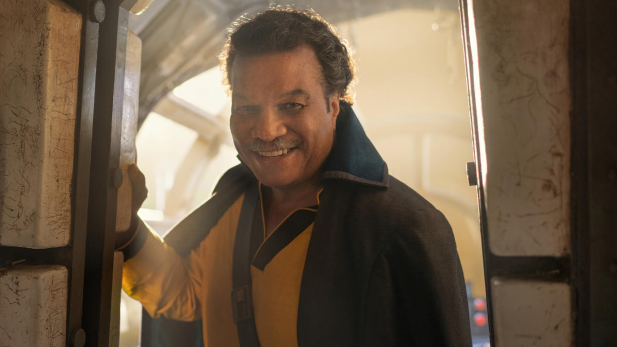  Billy Dee Williams standing in the doorway of the Millennium Falcon in Star Wars: The Rise of Skywalker. 