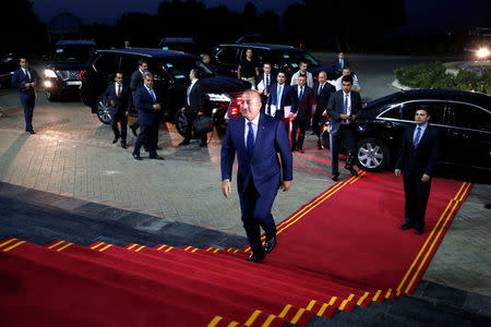 Turkey's Foreign Minister Mevlut Cavusoglu arrives to meet Iraq's Kurdistan region's President Massoud Barzani in Erbil, Iraq, August 23, 2017. REUTERS/Azad Lashkari