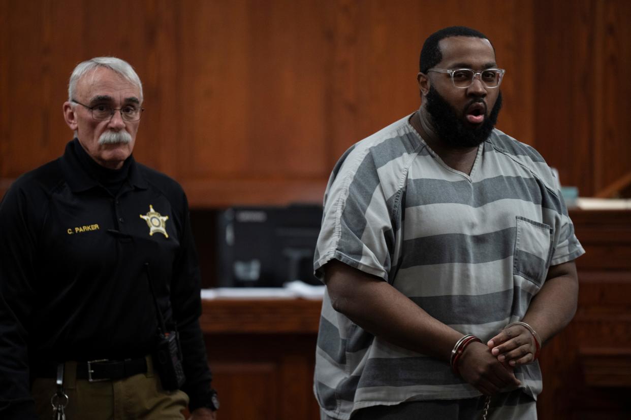 John Gentry, 37, appears in court at the Boone County Justice Center in Burlington, Ky. A judge ordered that Gentry's capital murder trial will remain in Boone County after his lawyers expressed worries about racist comments about the case on Facebook.