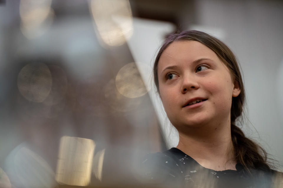 Greta Thunberg speaks at an event with other climate activists in London, England. [Photo: Getty]