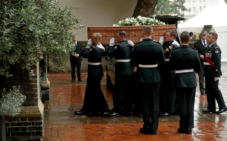 Pallbearers from the Second Battalion, Princess Patricia's Canadian Light Infantry - Credit: AP Photo/Matt Dunham