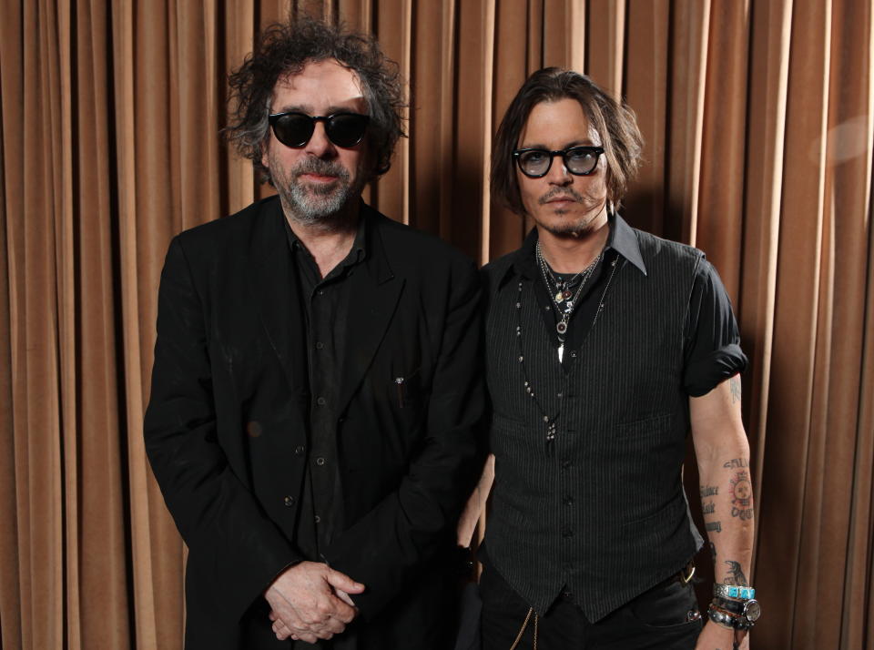 LAS VEGAS, NV - APRIL 24:  (EXCLUSIVE COVERAGE) Director Tim Burton and Johnny Depp at Warner Bros. Pictures Present The Big Pictures 2012 At CinemaCon at Caesars Palace on April 24, 2012 in Las Vegas, Nevada.  (Photo by Eric Charbonneau/WireImage)