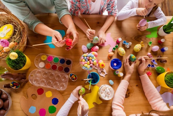 Top above high angle view of work place table nice group of people hands doing making decor accessory things classes courses studying in house indoors