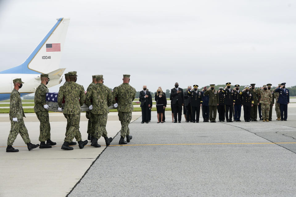 Joe Biden with Navy carry team 