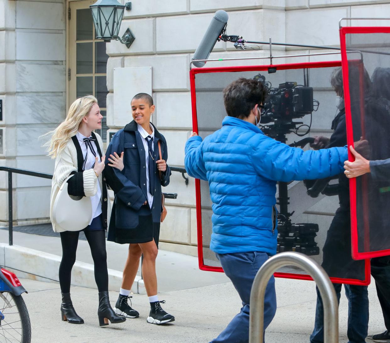 Emily Alyn Lind and Jordan Alexander are seen at the film set of the "Gossip Girl" TV series on March 15, 2021, in New York City.