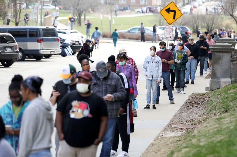 FILE PHOTO: Voters wait to cast ballots during the presidential primary election in Wisconsin